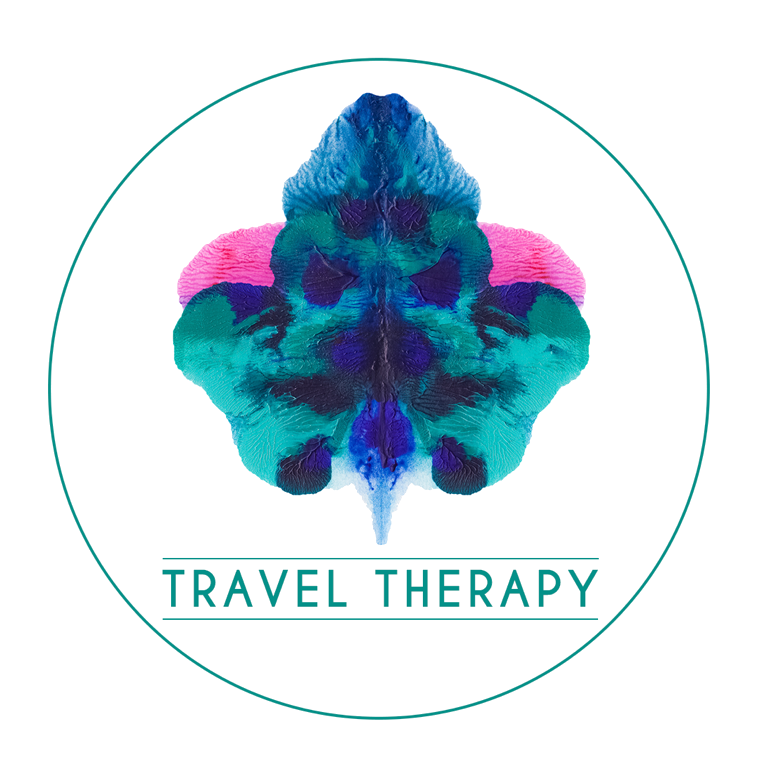 The Travel Therapy mark: an inkblot inside a ring, above the words Travel Therapy.